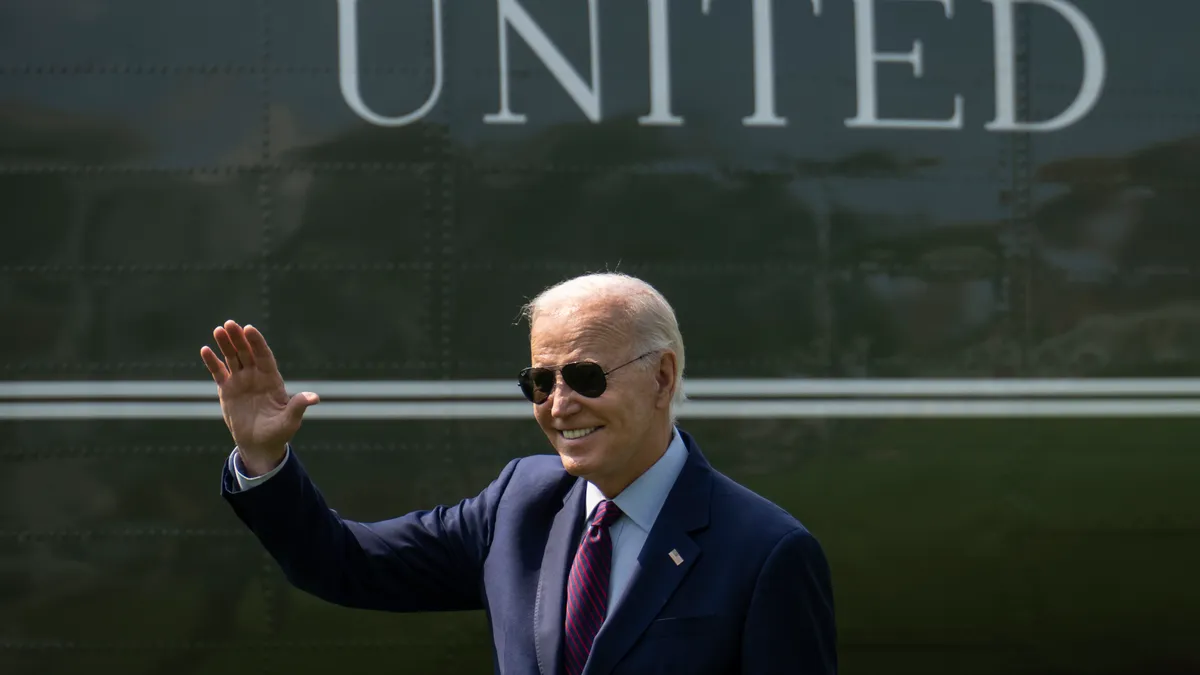 U.S. President Joe Biden waves toward visitors watching the departure as he walks to Marine One on the South Lawn of the White House July 28, 2023 in Washington, DC.