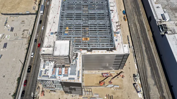 An aerial view of a three-level data center under construction