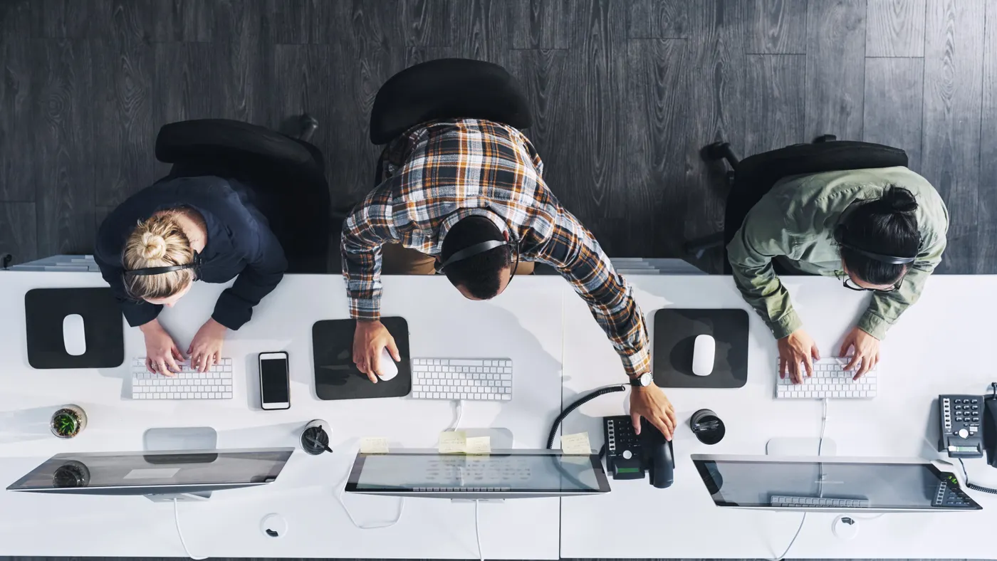 High angle shot of a group working in an office