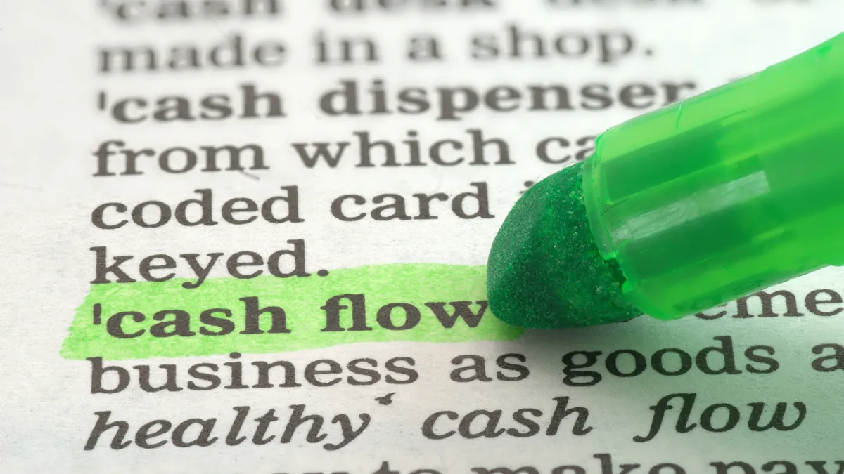 Image of a paper with "cash flow" highlighted