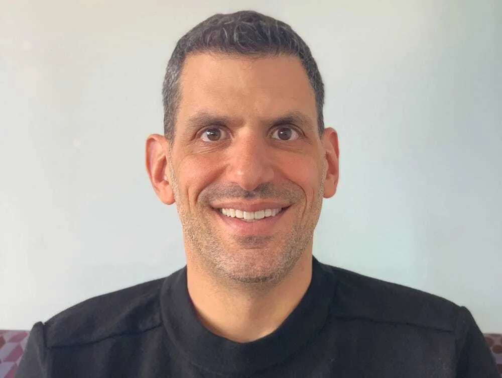 A headshot of Paul Rubenstein, chief people officer at Visier