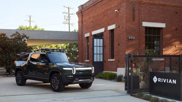 A R1-T electric pickup parked outside of Rivian's retail hub in Venice, California.