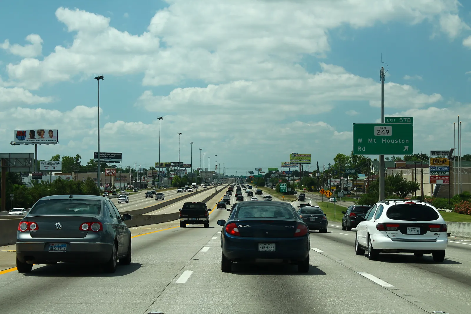 Road-level view of a multi-lane highway.