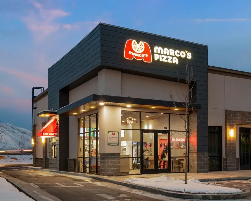 An evening image of Marco's Pizza