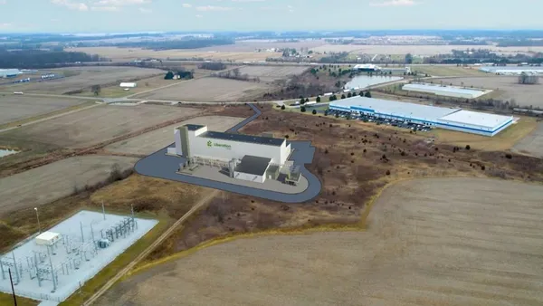 Image of Liberation Labs' building in the middle of a field.