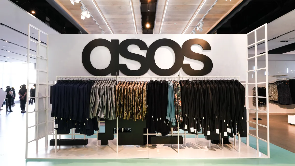 ASOS logo on a rack of clothing