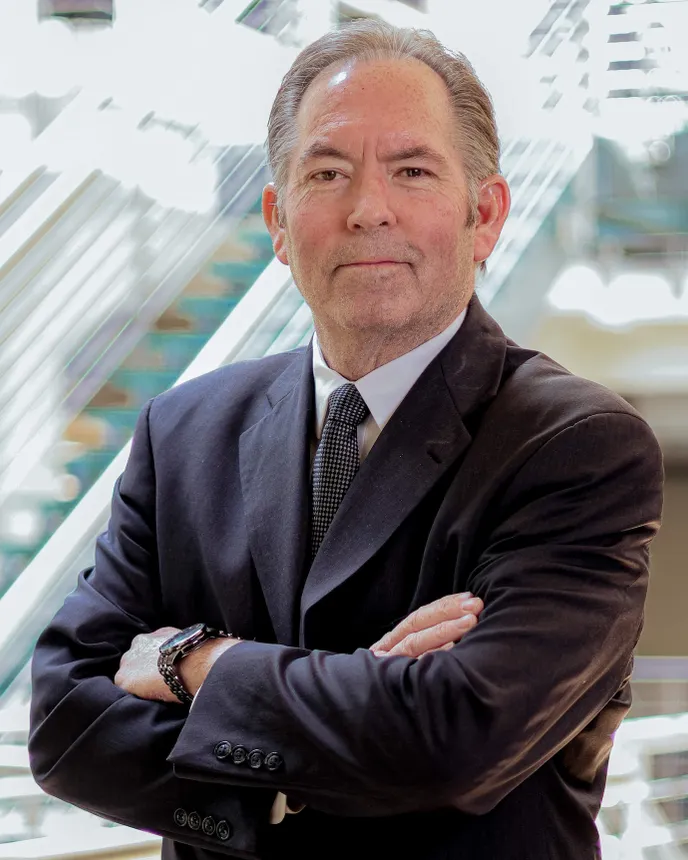 A headshot of Troy Thompson.