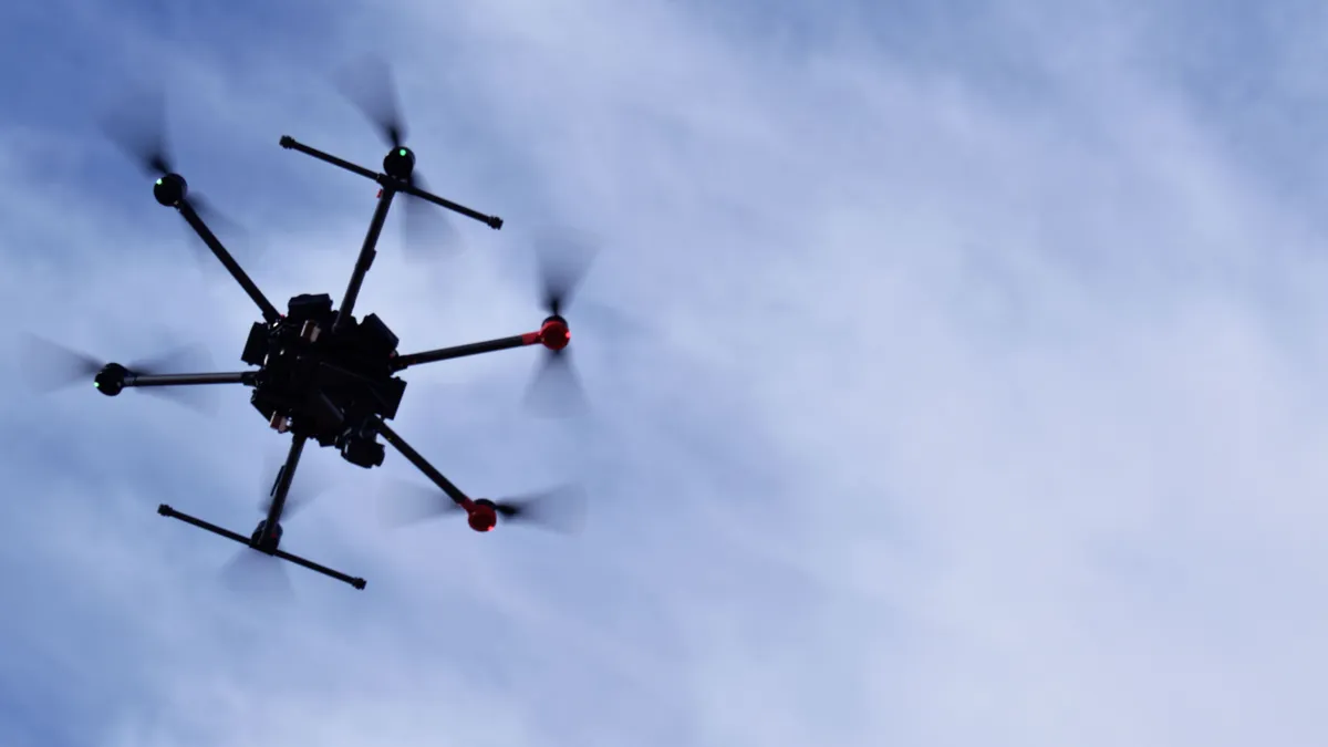 image of drone flying in the sky