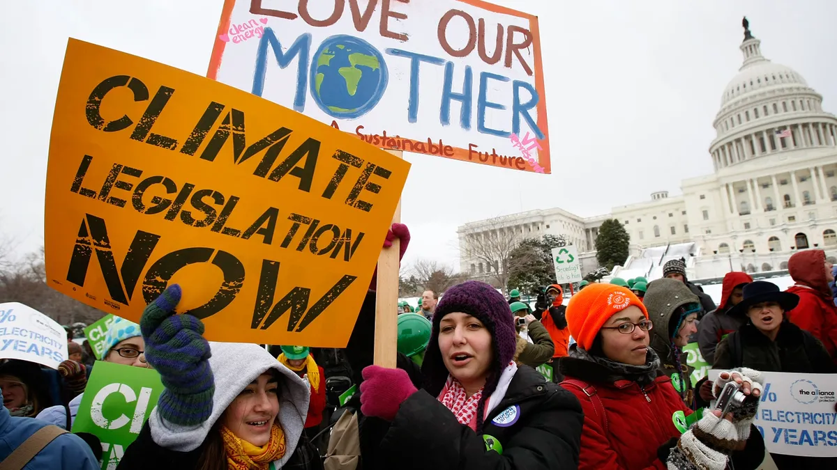 Activists protest outside the U.S. Capitol building.