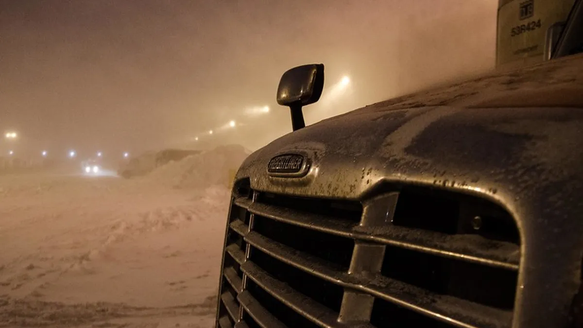 A truck in a snow-covered area.