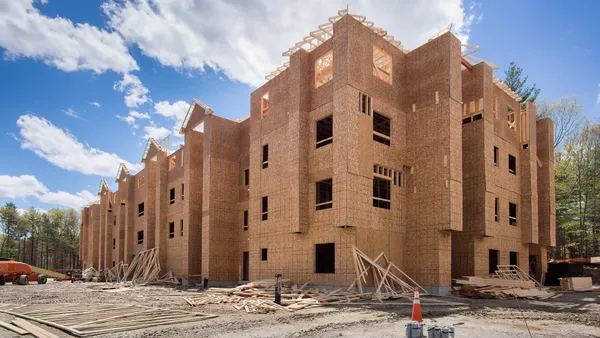 Wood-framed apartment complex under construction