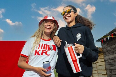 Two models wearing KFC merch