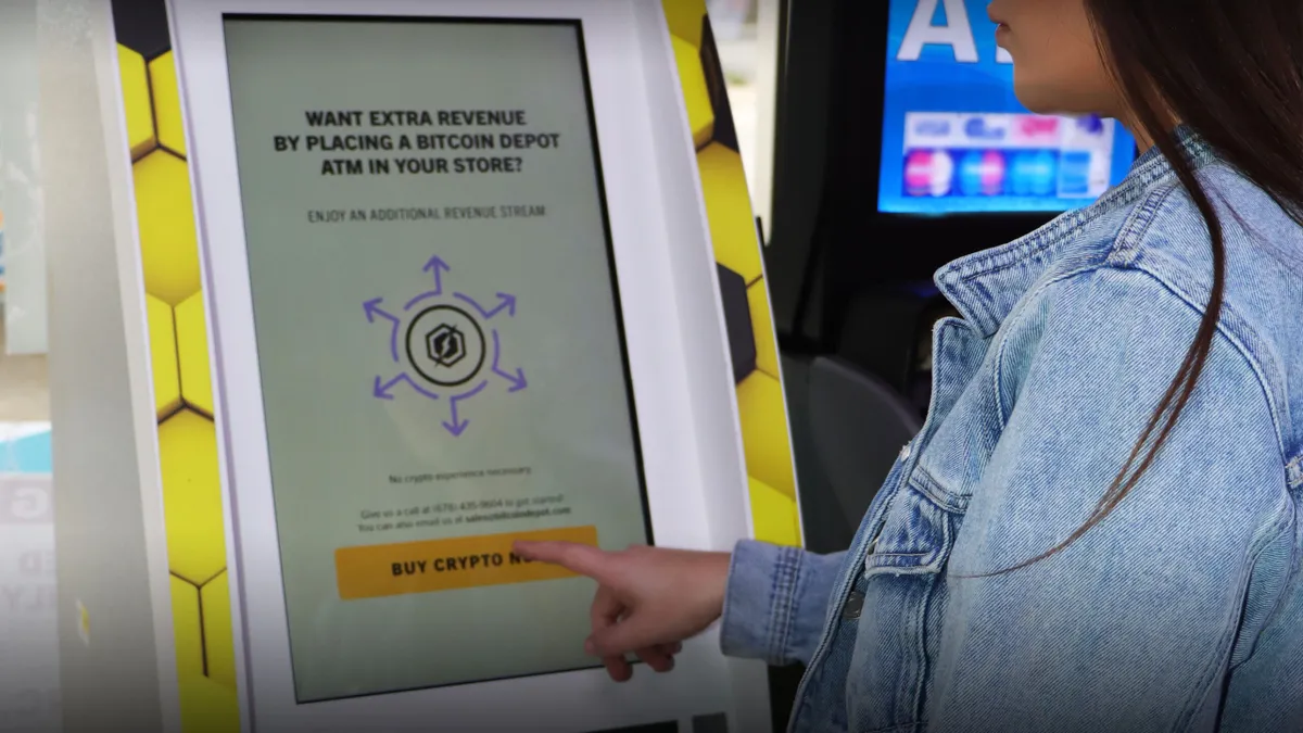 A photo of a person using a Bitcoin Depot bitcoin ATM.