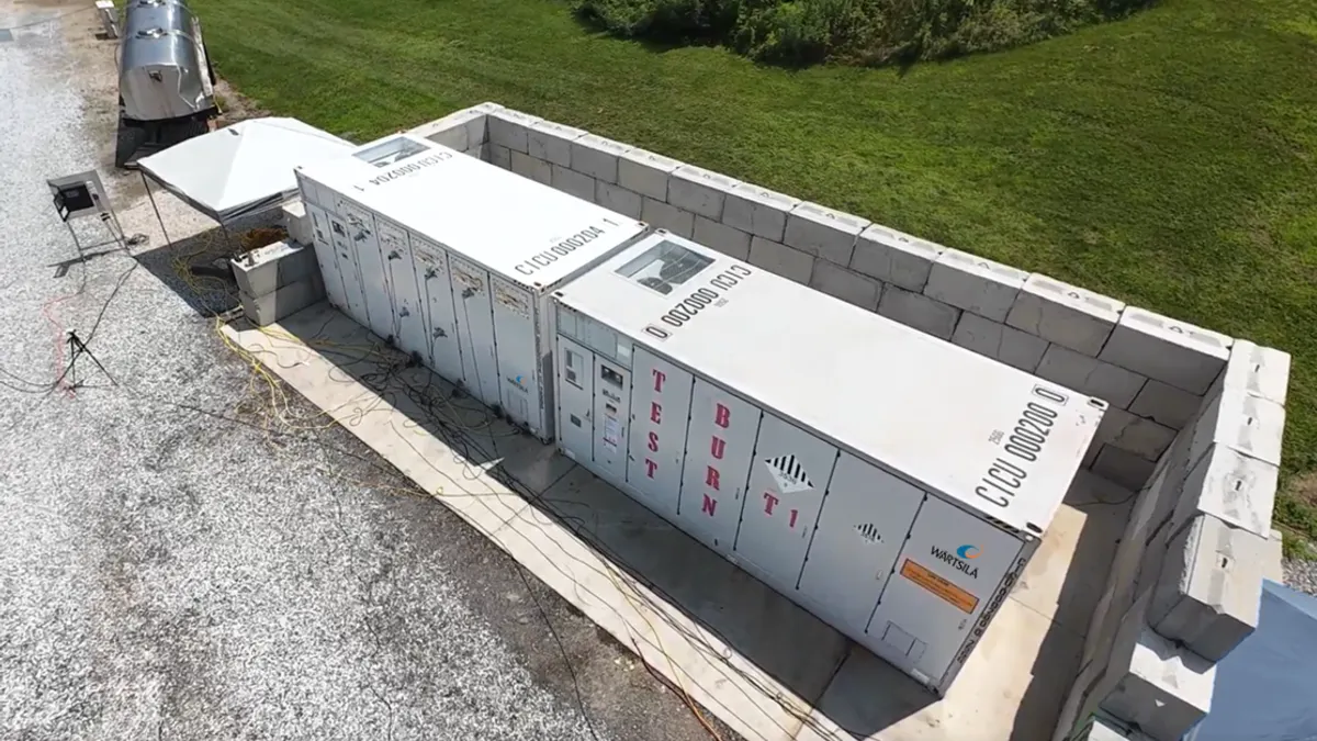 Battery energy storage units at a renewable energy facility