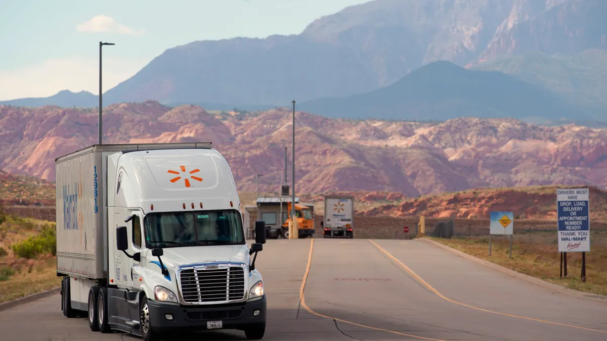 Walmart trucks enter and leave a regional distribution center in Washington, Utah on June 6, 2019.