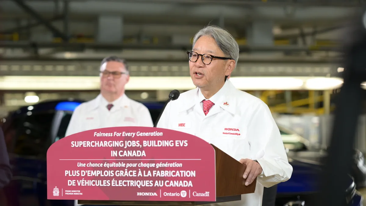 Toshihiro Mibe, President and CEO of Honda Motor Co. speak at an event at the automaker's manufacturing plant in Allison, Ontario.