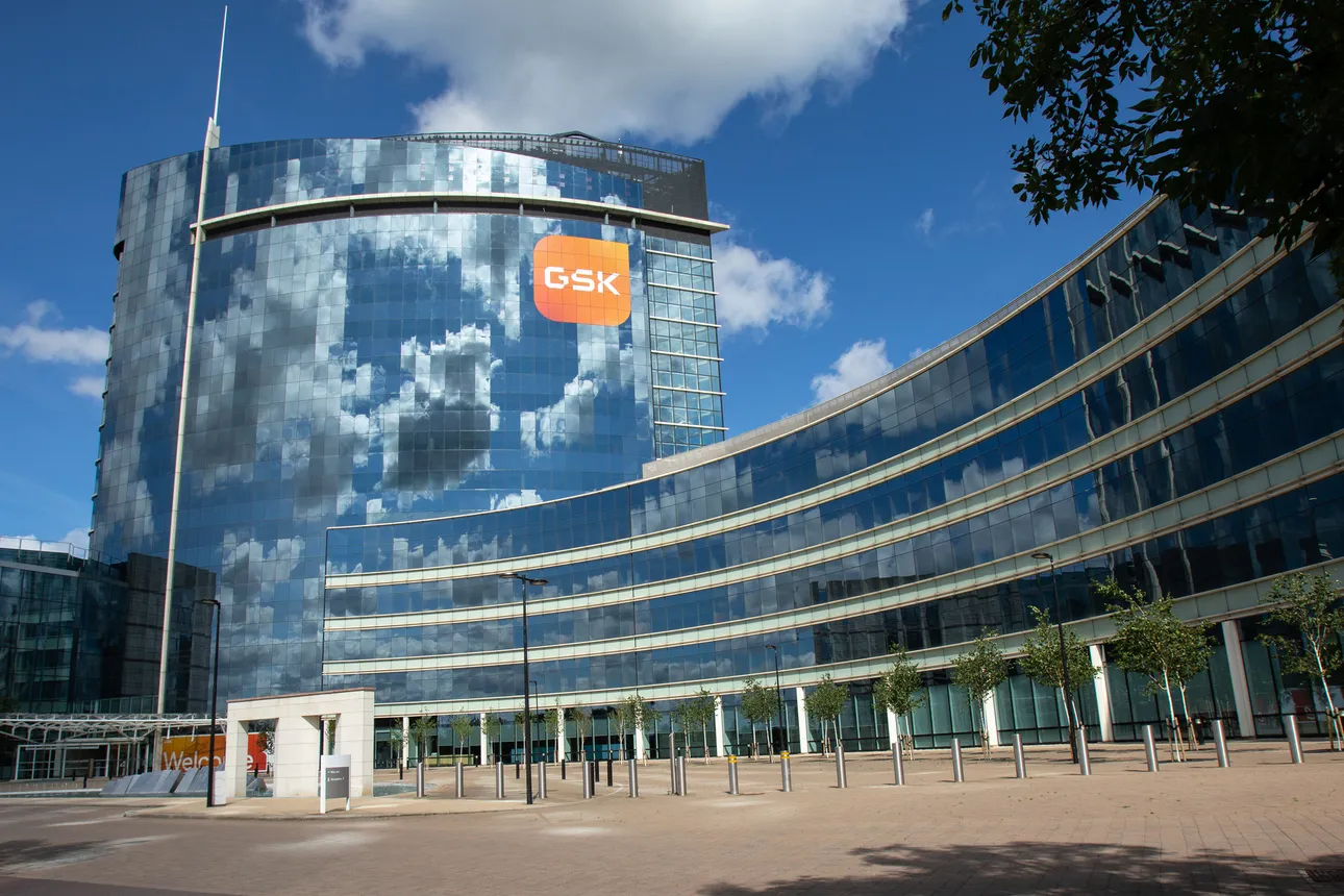 A photo of a building showing a GSK sign in London.