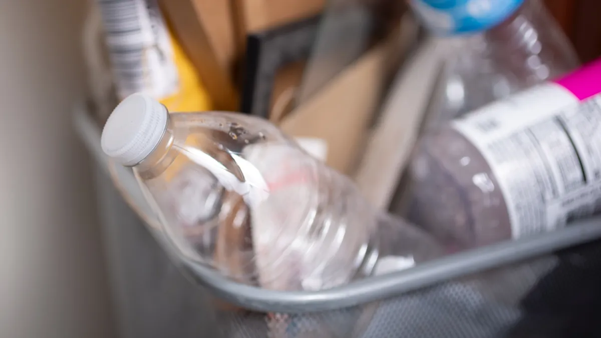 Plastic bottle in recycling bin