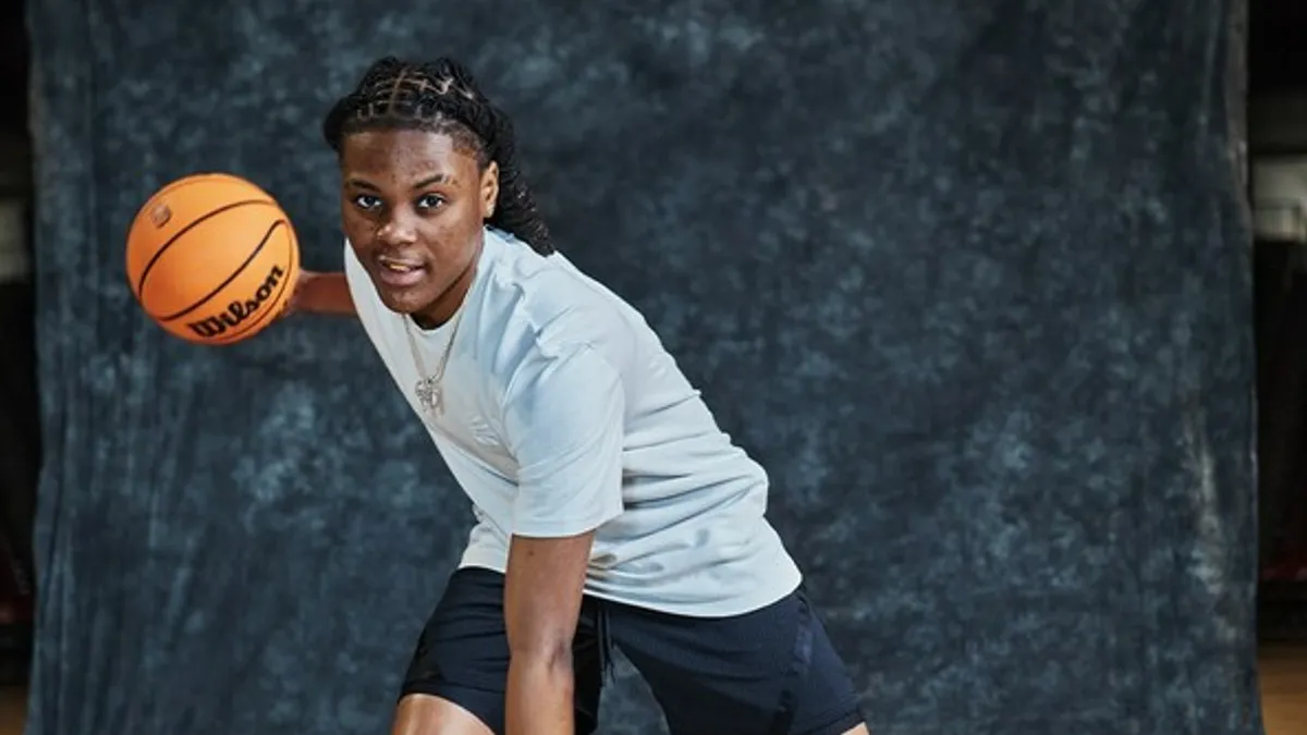 MiLaysia Fulwiley with a basketball.