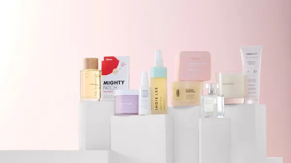 An assortment of beauty products on pedestals that will be available through Belk with BeautySpace
