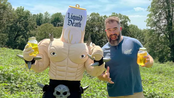 Liquid Death's mascot and Jason Kelce for a campaign by Liquid Death and Garage Beer