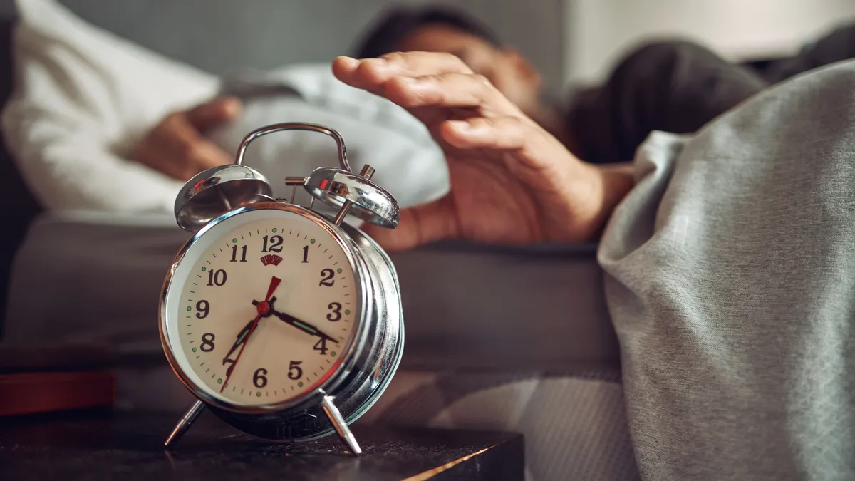 Alarm clock on nightstand.