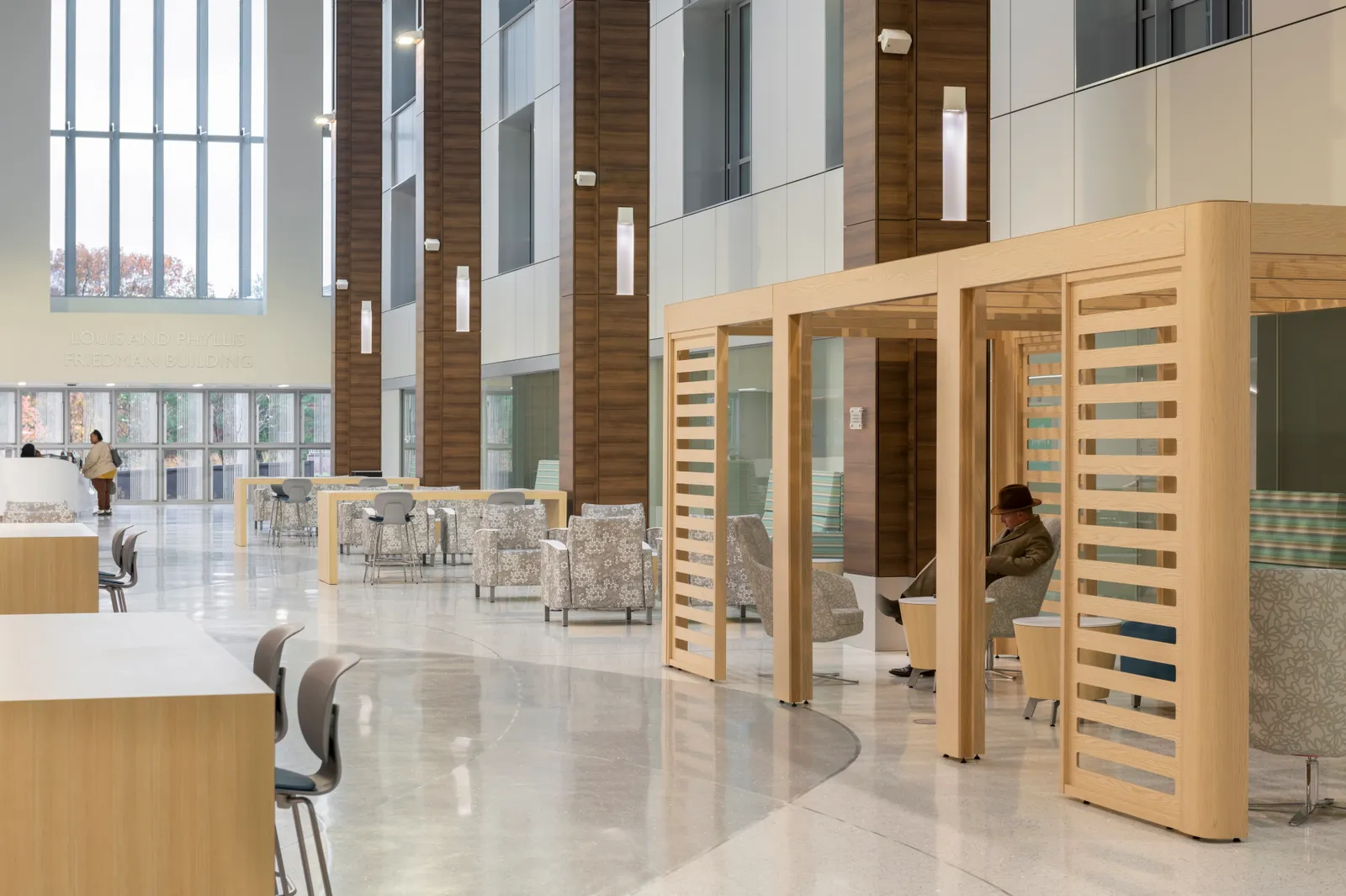 The three-story atrium floods the public space and waiting area in the Friedman Building with natural light.