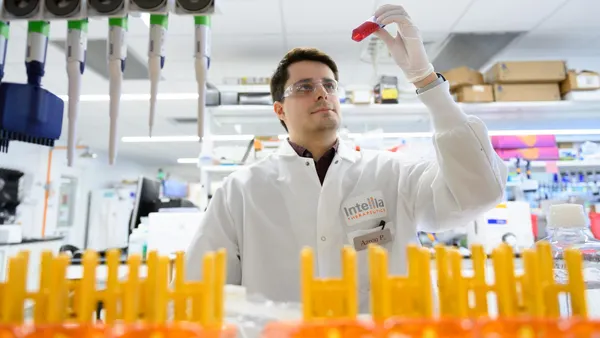 A photograph of Intellia scientists in the lab