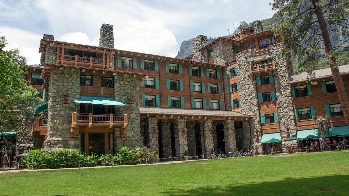 A photo shows the historic Ahwahnee Hotel in Yosemite National Park.