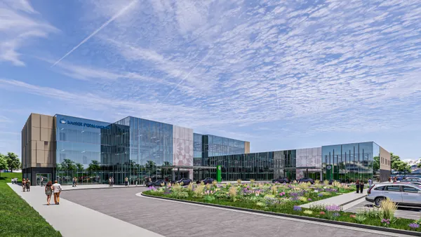 A rendering of a large glass building against a backdrop of a blue sky