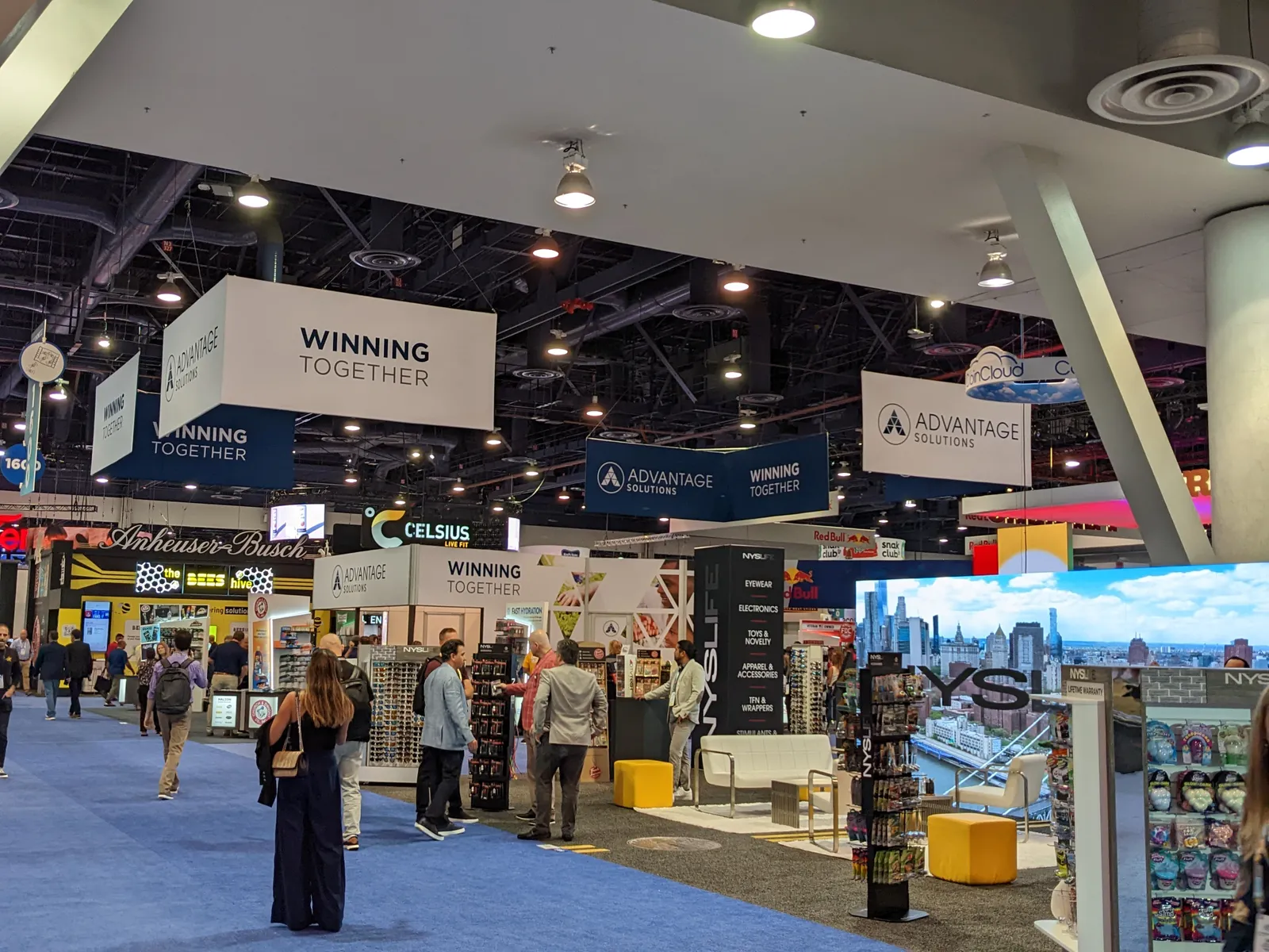 Show floor at NACS 2022 with Anheuser-Busch and Celsius signs