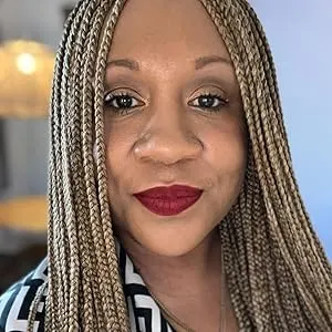 A profile photo of Dawn Brooks-DeCosta&#x27;s head and shoulders