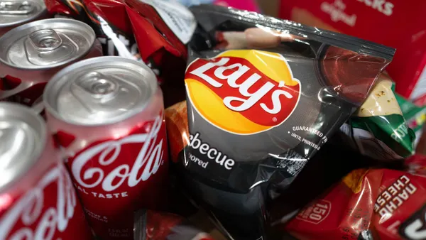 Food products manufactured by Mondelez and Coca-Cola are shown