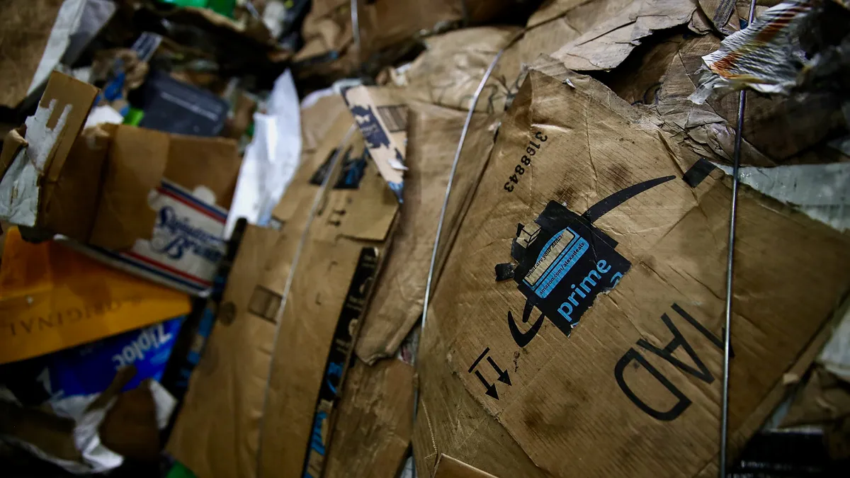 Bale of cardboard for recycling, with Amazon logo