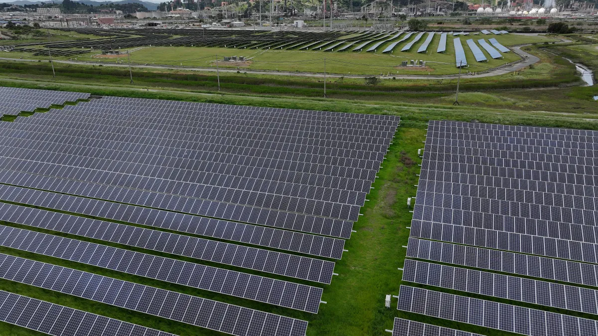 In an aerial view, solar panels are seen at MCE Solar One solar farm on April 25, 2024 in Richmond, California.