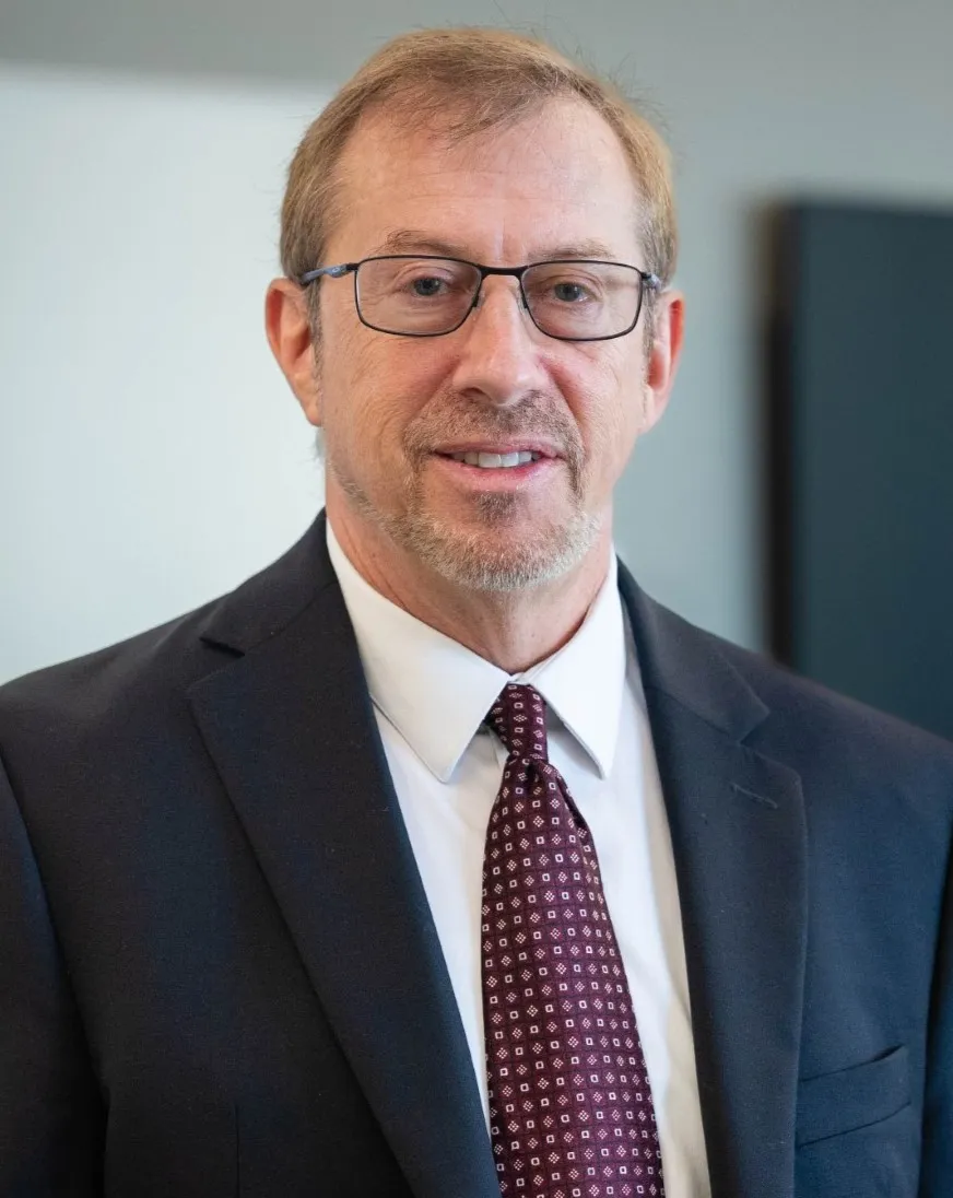 A headshot of Brian M. Kleiner.