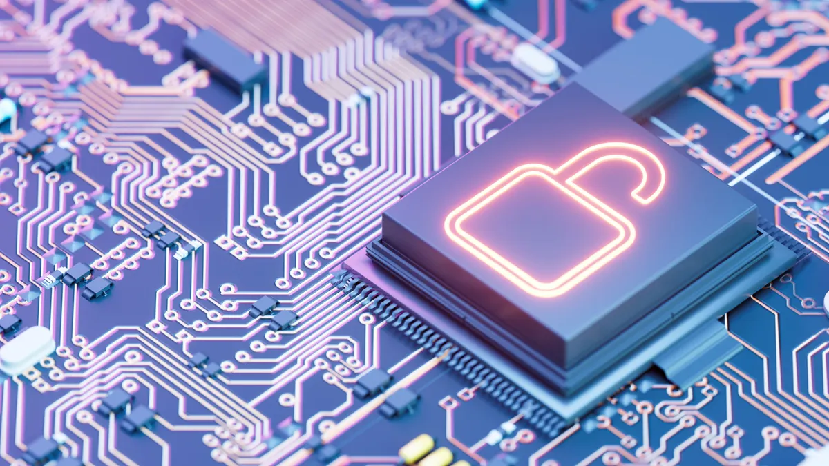 open padlock on chip of motherboard - stock photo