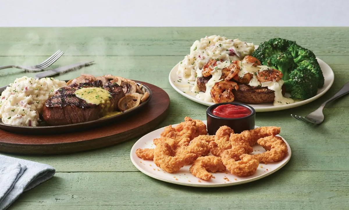 A photograph of Applebee's steak with shrimp add-on.