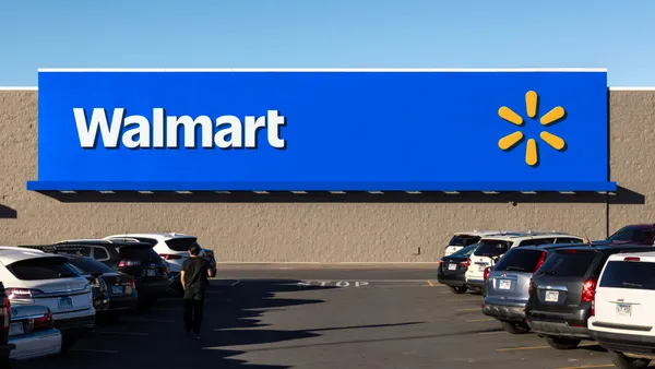 A Walmart storefront showcases its refreshed brand identity, with a new typeface and the spark logo set apart as a standalone asset.