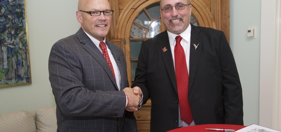 Miami University President Gregory Crawford and Miami Tribe of Oklahoma Chief Douglas Lankford after signing of new Memorandum of Agreement about new jointly owned Myaamia Heritage Logo.