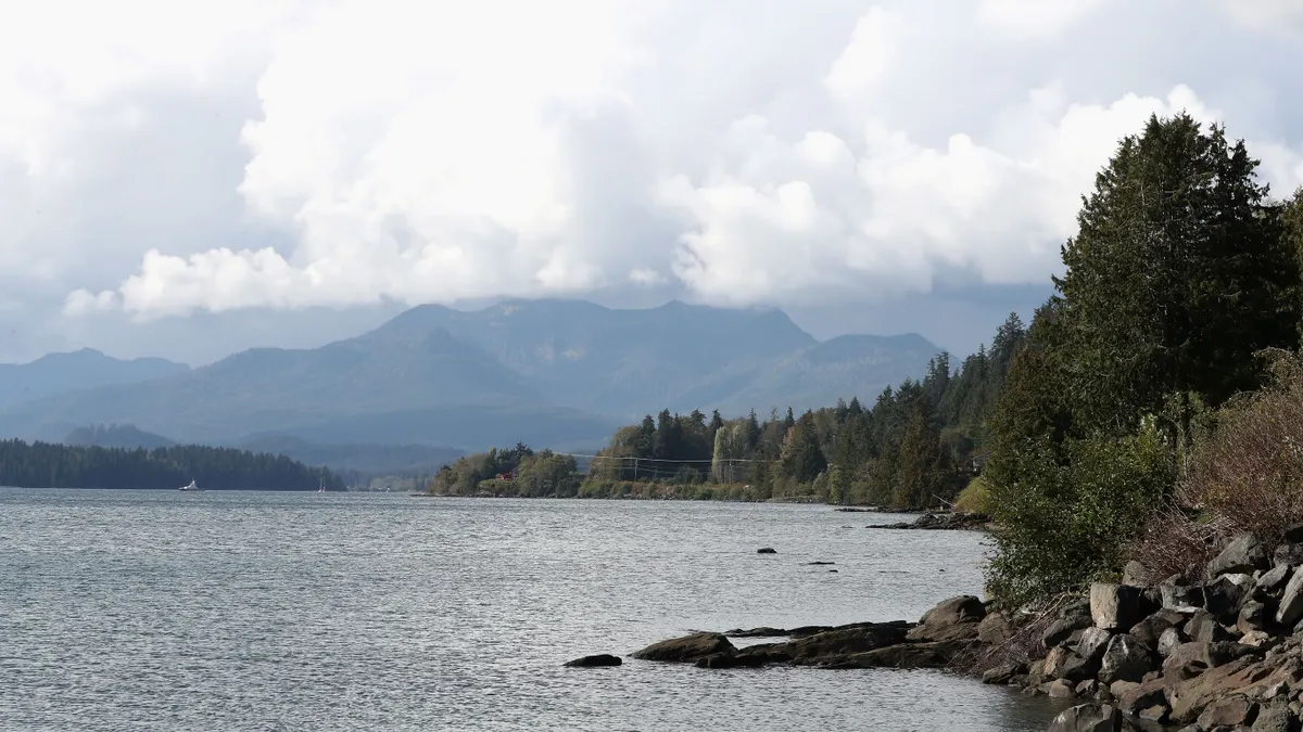 A panoramic view of mountains and the ocean near Haida Gwaii