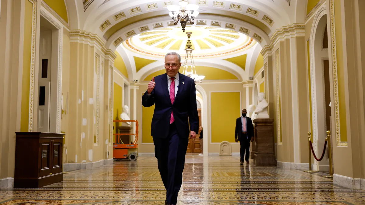 U.S. Senate Majority Leader Chuck Schumer (D-NY) gives a thumbs up as he walks to a press conference after final passage of the Fiscal Responsibility Act at the U.S. Capitol Building on June 01, 2023