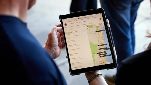 Man looking at tablet screen