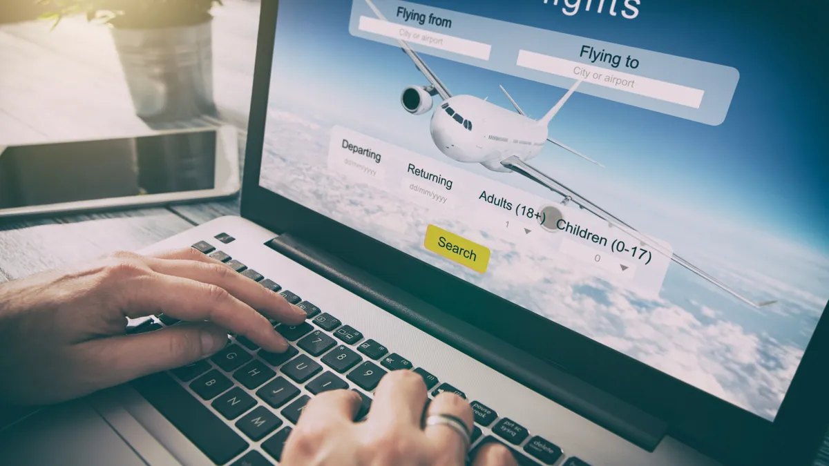 Person uses a flight booking website