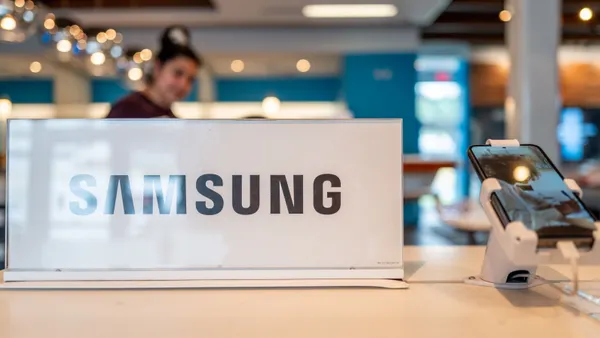 A Samsung smartphone sits on display at an AT&T store.