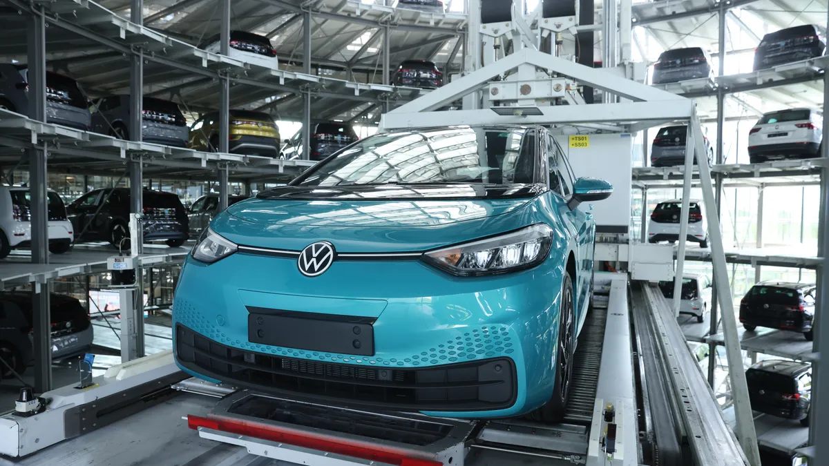 Volkswagen ID.3 electric cars stand in the storage tower following assembly at the "Gläserne Manufaktur" ("Glass Manufactory") production facility on June 08, 2021 in Dresden, Germany.