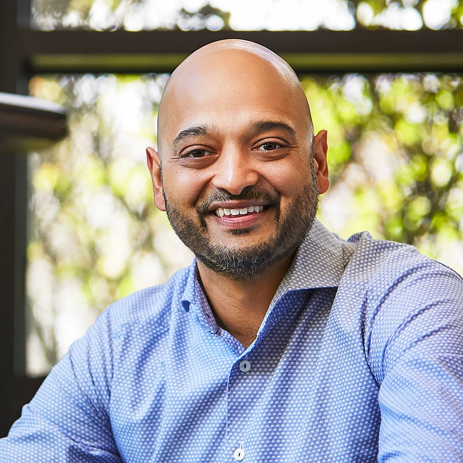 a headshot of Alok Ajmera, CFO of Prophix