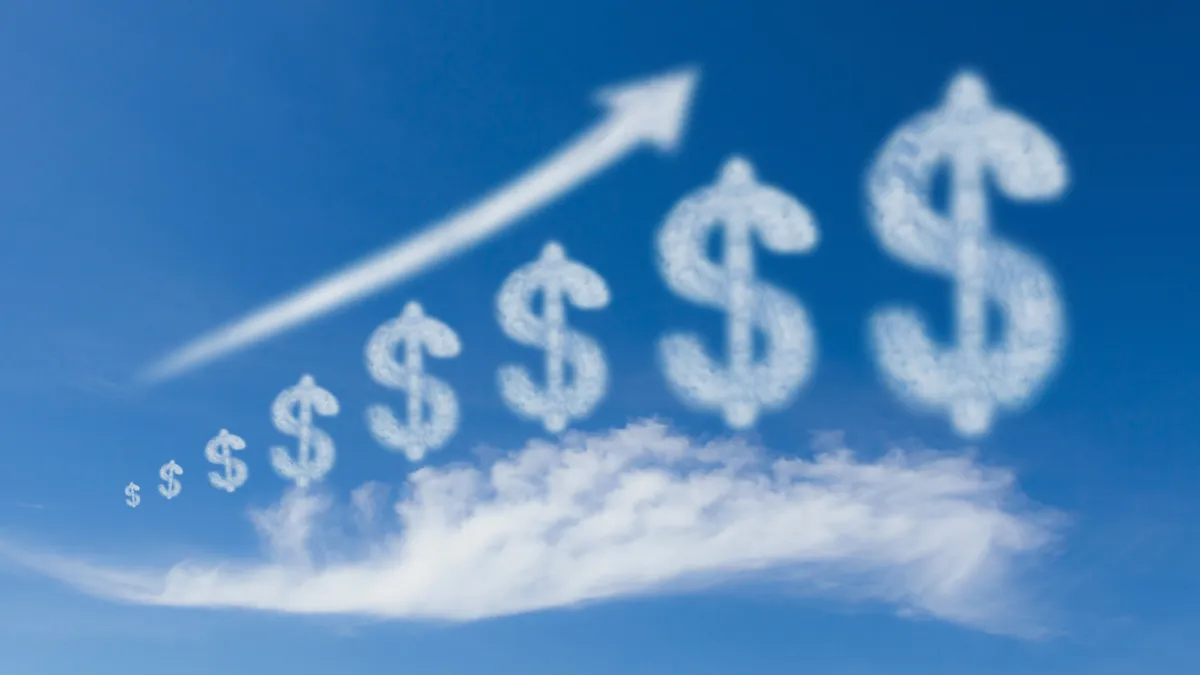 Growth business, cloud dollar sign grow up on blue sky