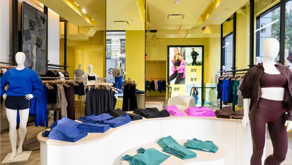 Mannequins display activewear offerings inside a store.