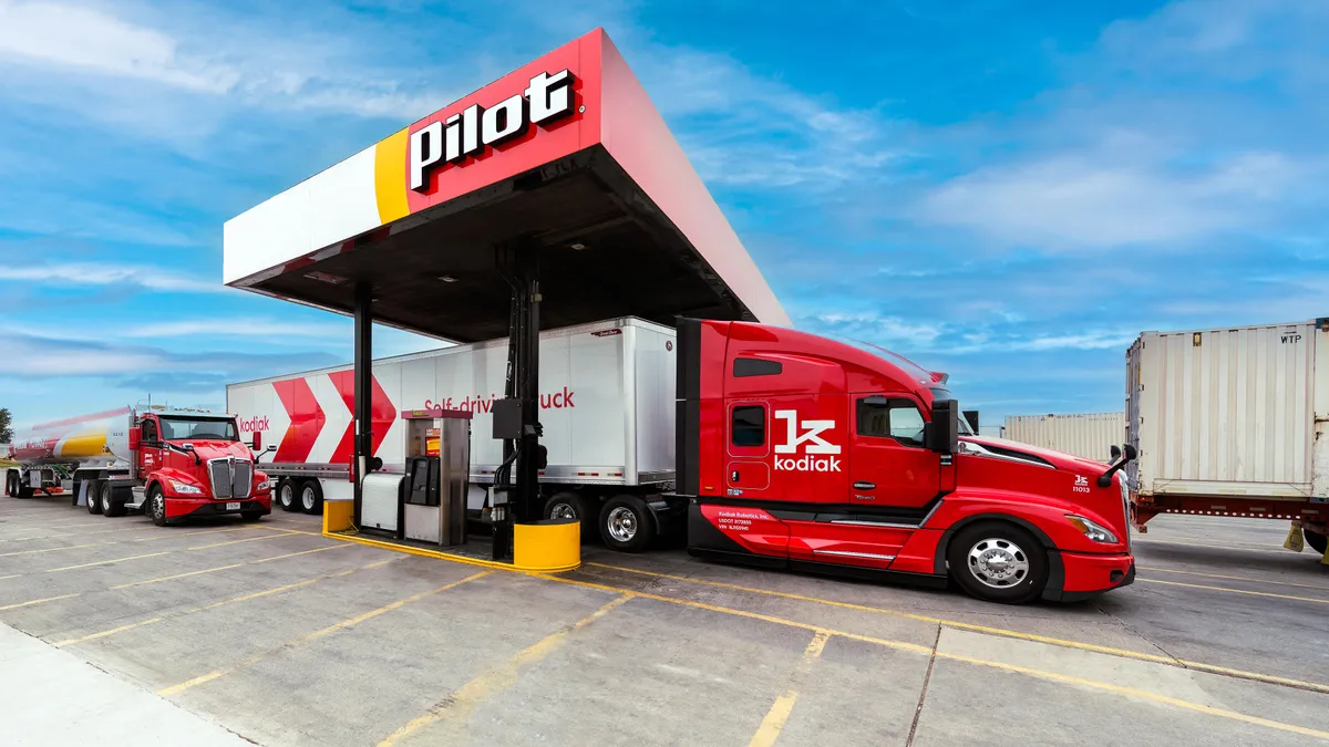 An AV truck at a Pilot fueling station.